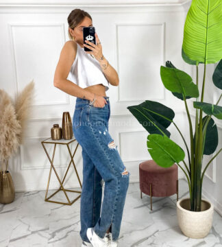 Jeans fermo strappi